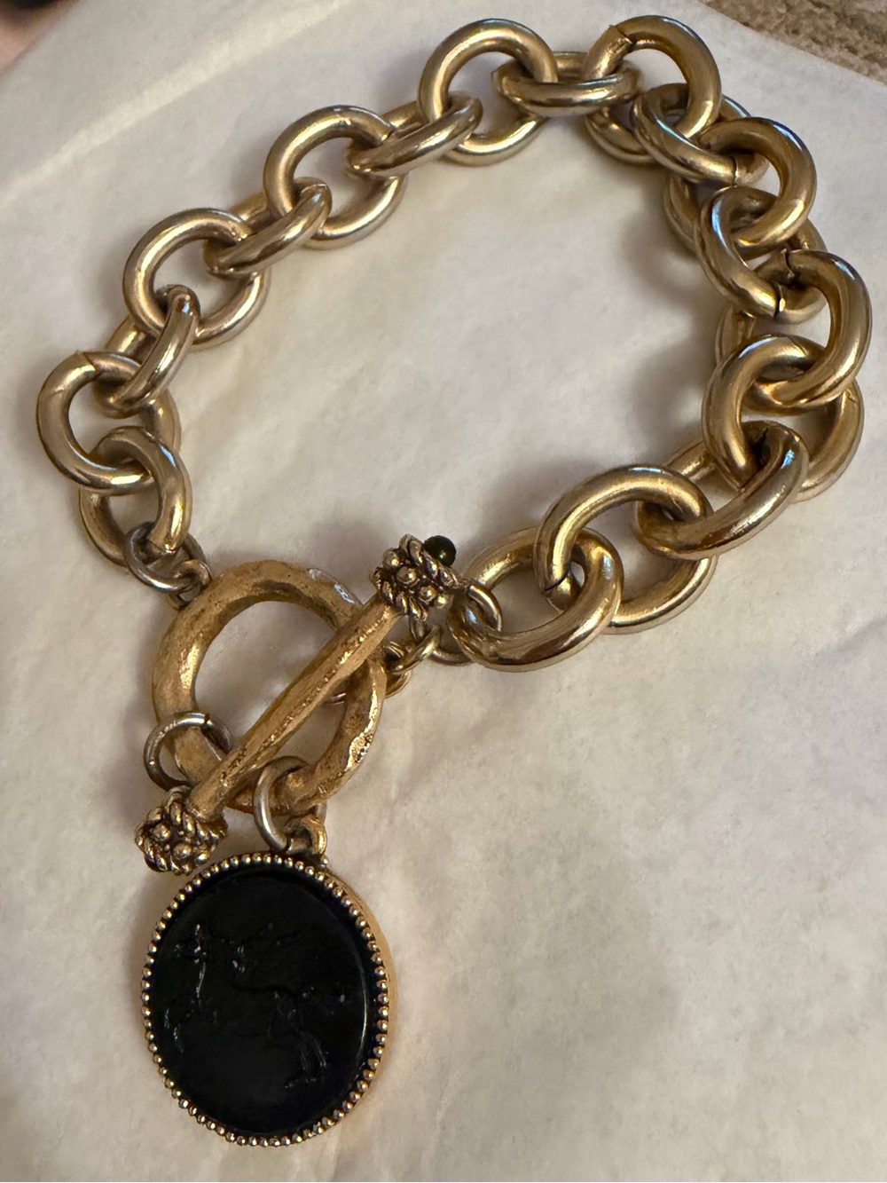 Gold-Tone Chain Bracelet with Black Cameo Charm